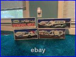 Lot of 14 HESS trucks. All new in box. Never displayed